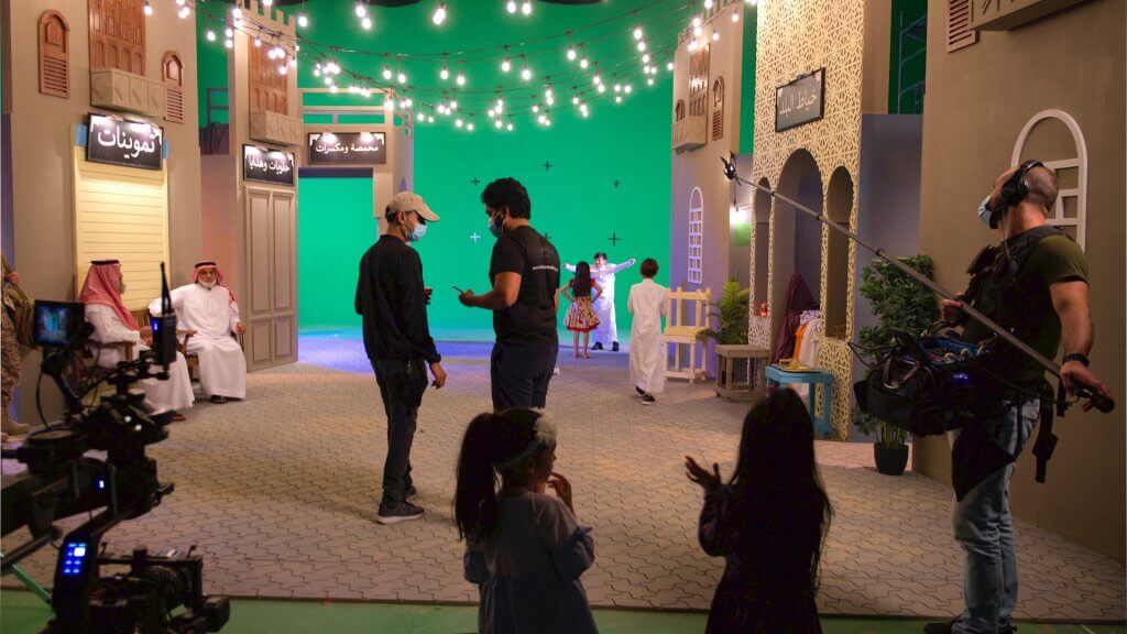 Xperiment Media on a film set with various actors on a soundstage with greenscreen