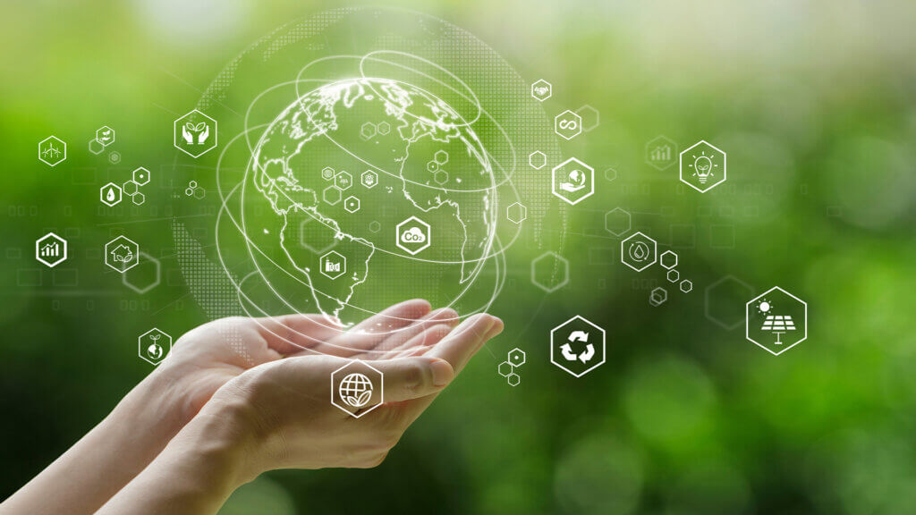Hands holding Global communication network with Environment icon on a green background.